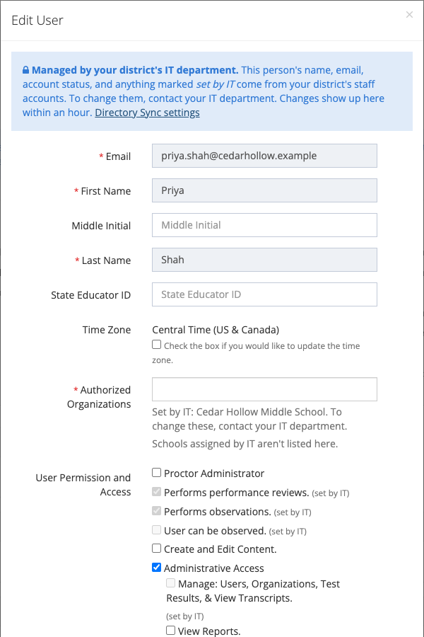 The Edit User window for a directory user, with name and email locked and directory-granted roles checked and disabled